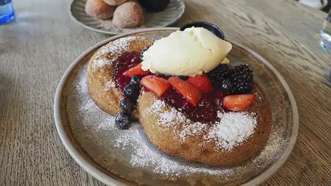 Pancakes with ice cream and berries
